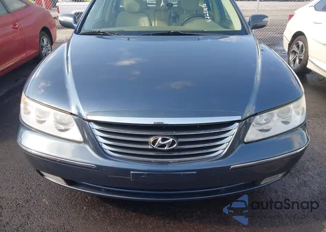 2009 Hyundai Azera Limited z USA, uszkodzony, nr VIN KMHFC46FX9A343602